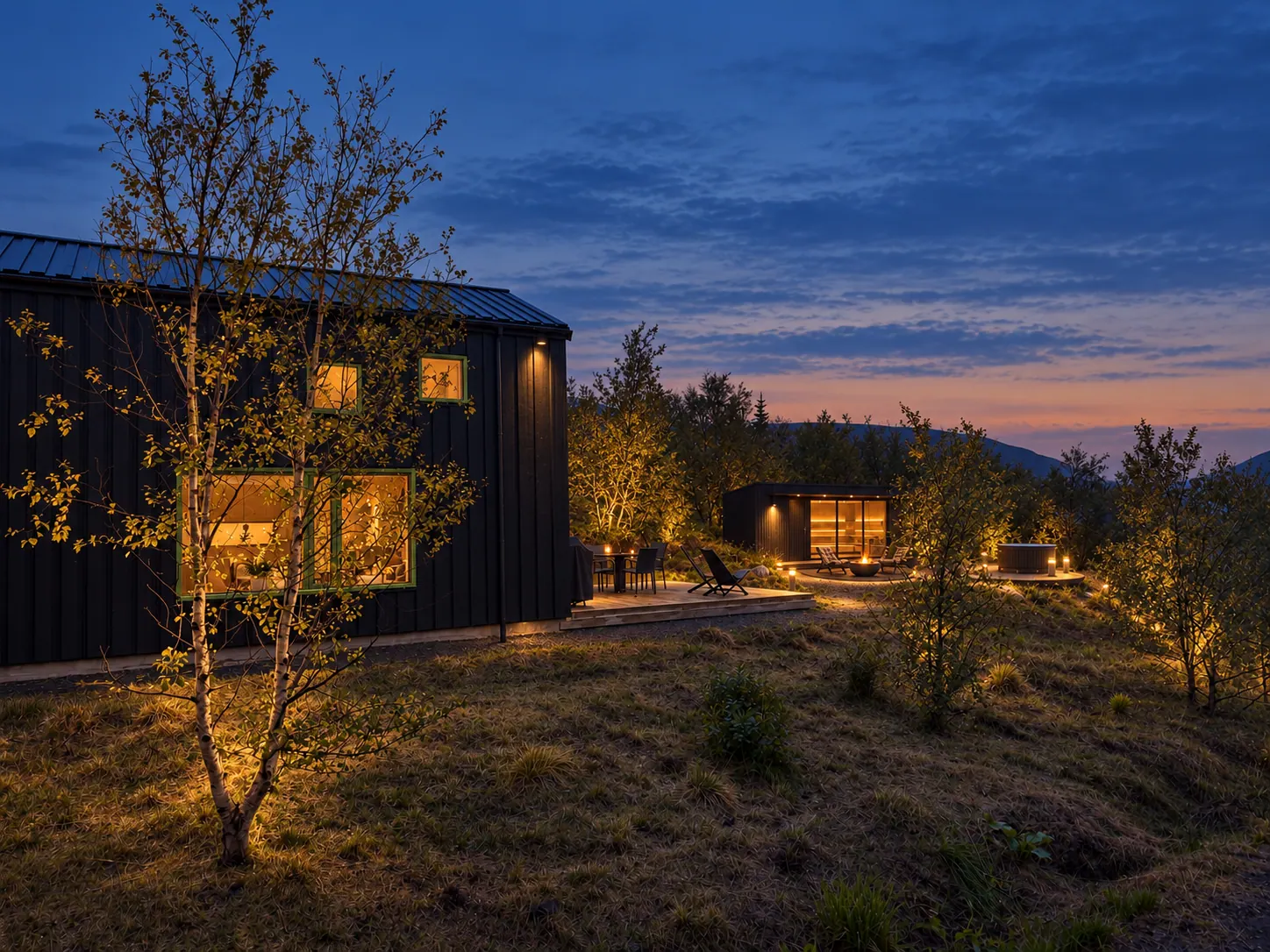 Path from the houses to the lit spa house at dusk
