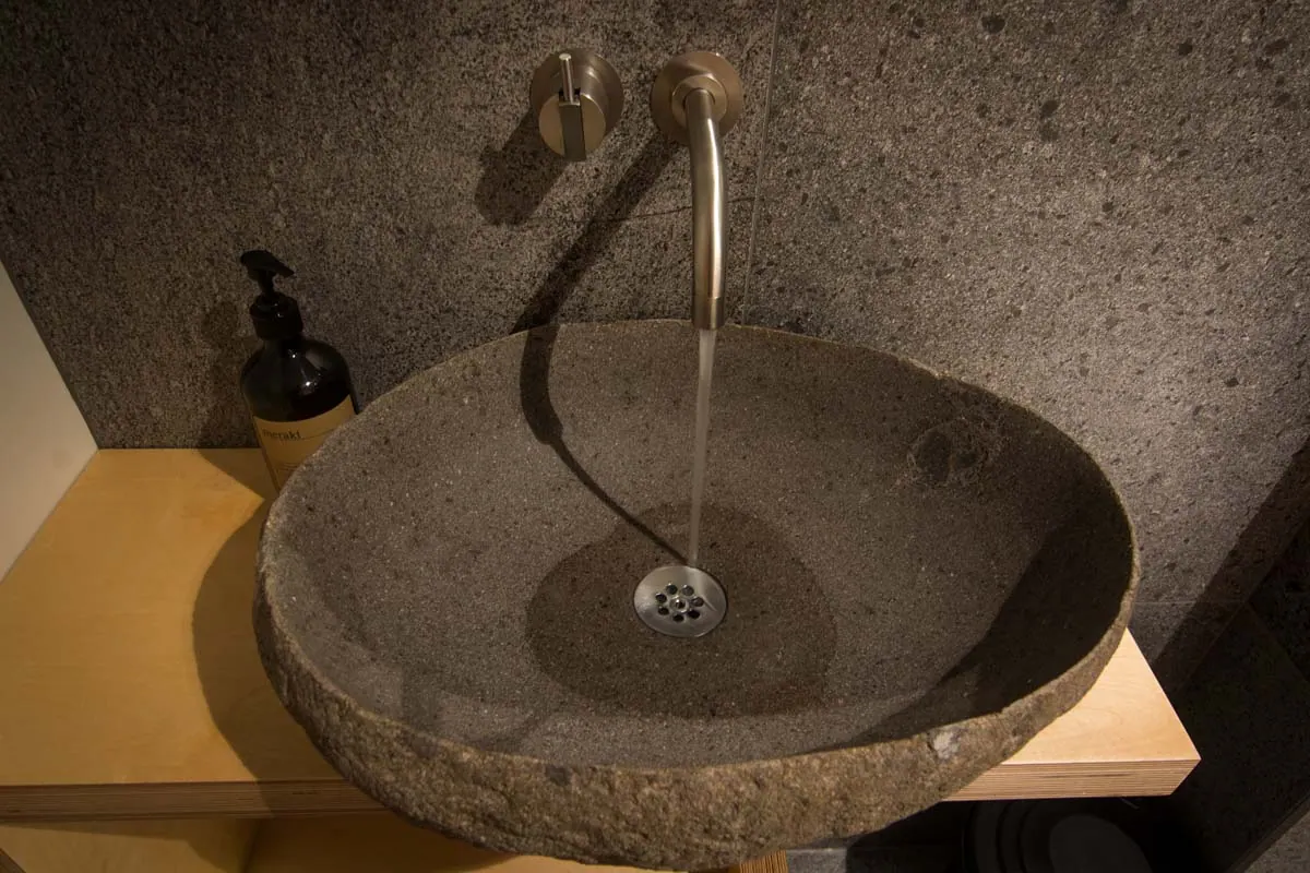 Apartment 15B: Stone basin in the bathroom