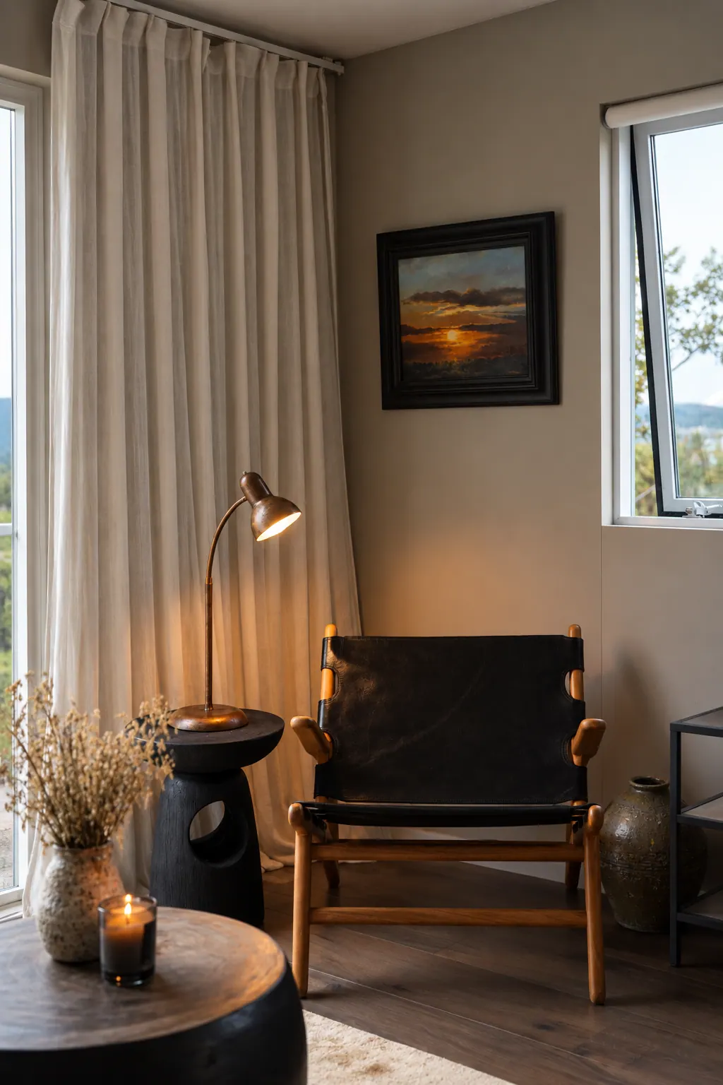 The Cottage: Reading corner with an armchair and lamp