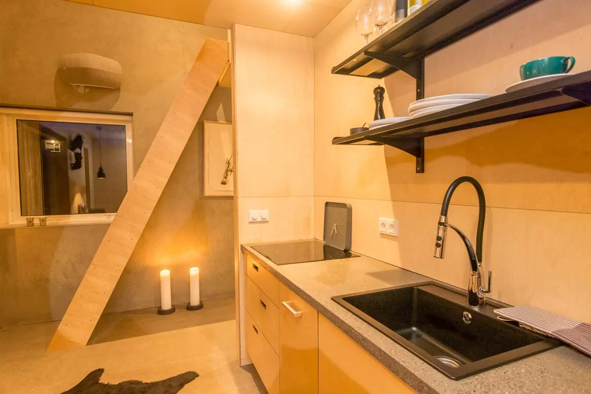 Apartment 15C: Kitchen sink beside the steep stairs