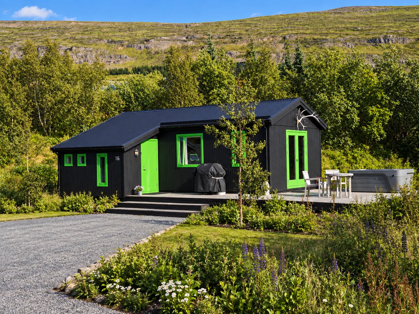 The Cottage: The Cottage and its terrace in summer
