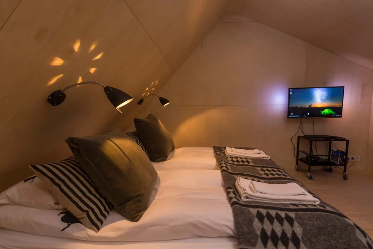 Apartment 15C: Bedroom with wall-mounted TV