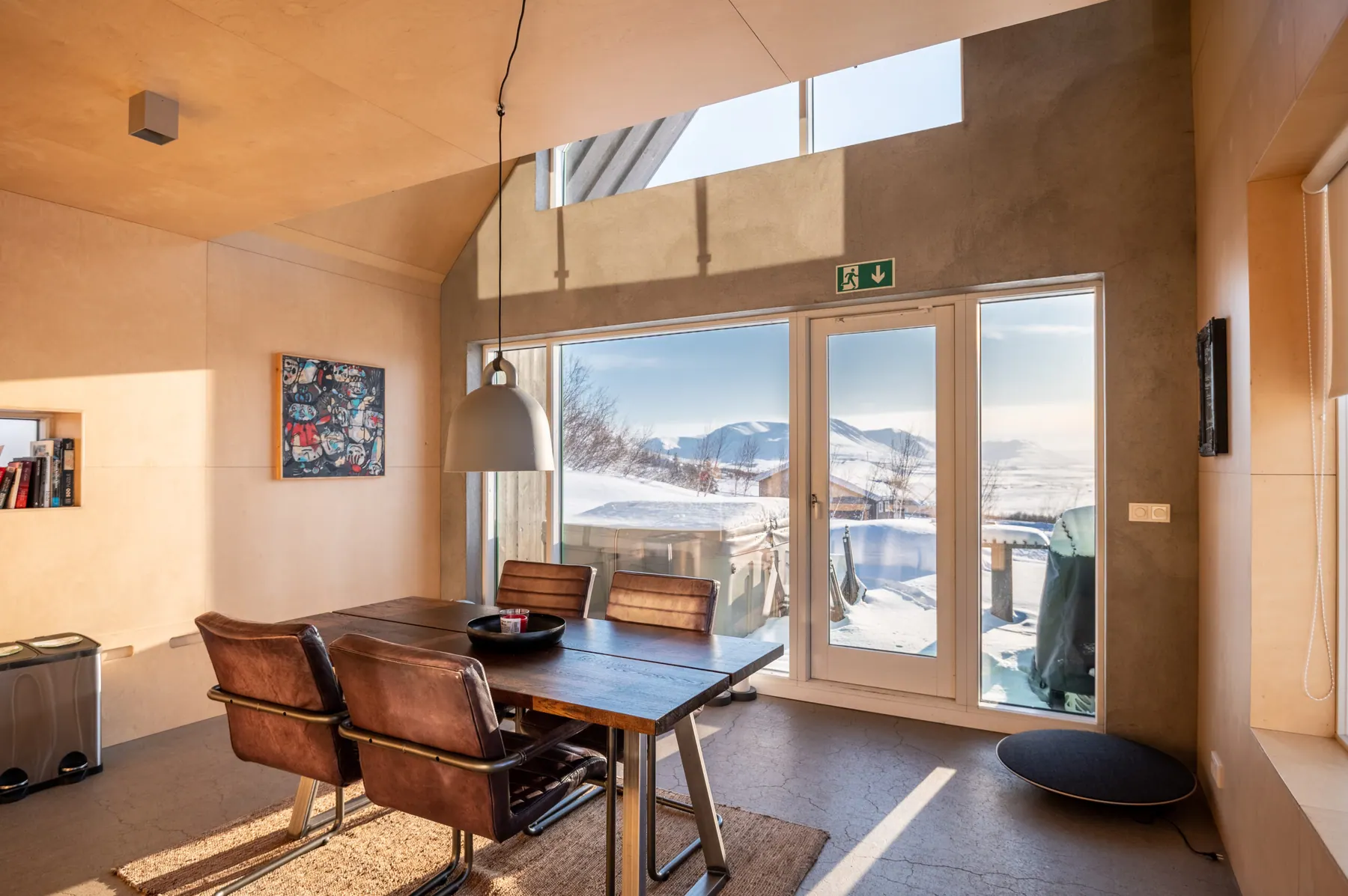 Apartment 15A: Dining area with large windows to the terrace