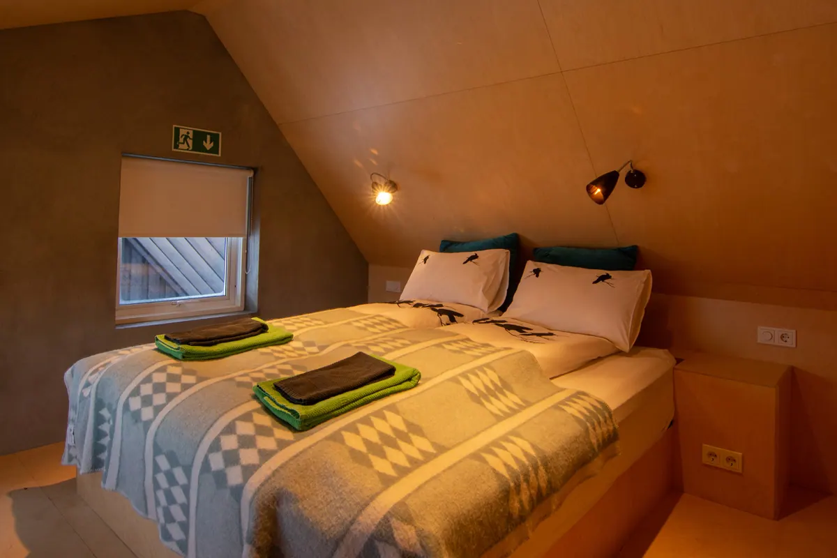 Apartment 15A: Bedroom with a queen-size bed and fresh towels