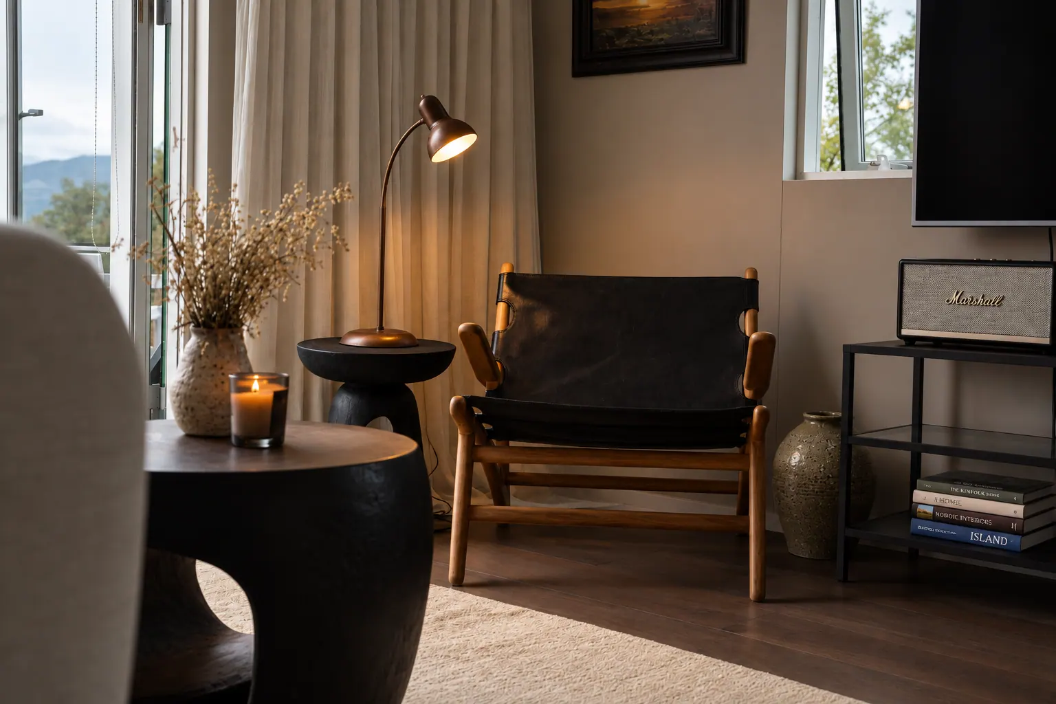 The Cottage: Living room with lounge chair and side table