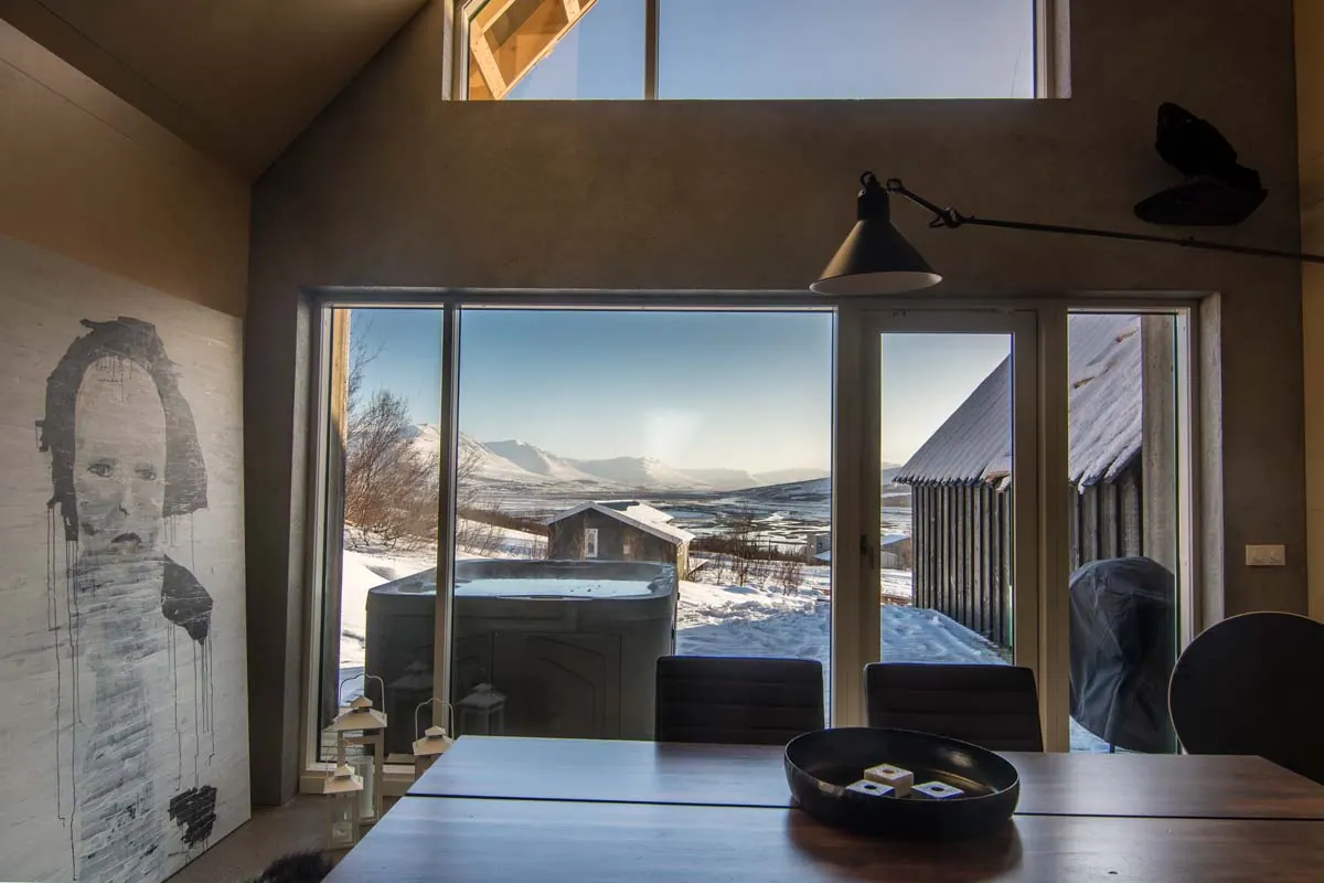 Apartment 15B: Living and dining area with large windows to the terrace